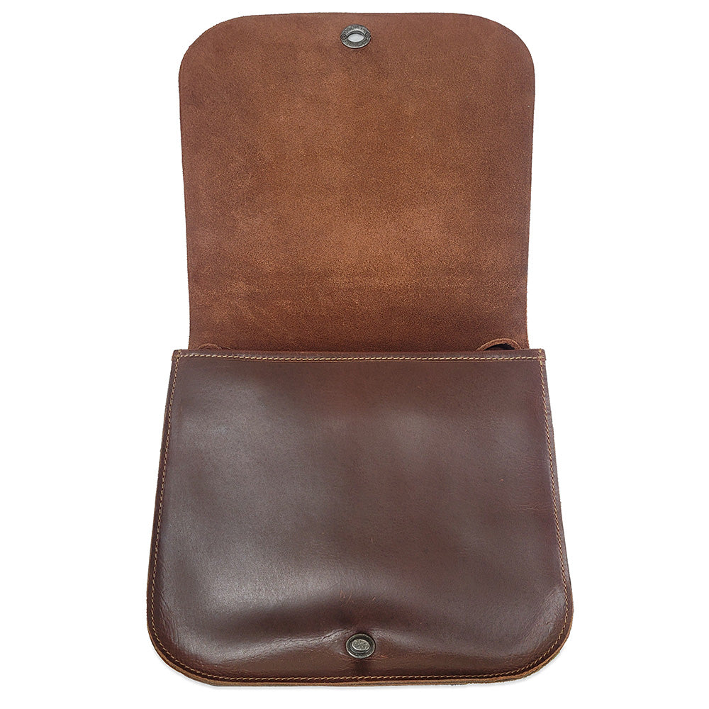 Brown leather pouch with a flap on a white background