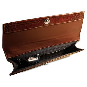Brown leather clutch bag with silver clasp on a white background