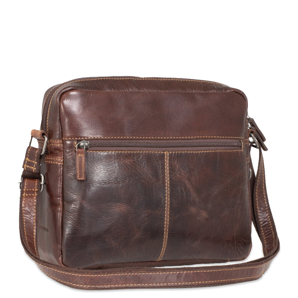 Brown leather shoulder bag on a white background