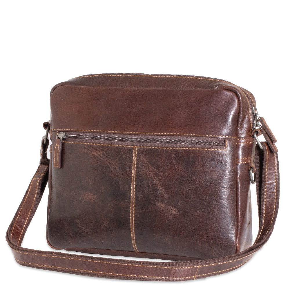 Brown leather shoulder bag on a white background