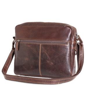 Brown leather shoulder bag on a white background