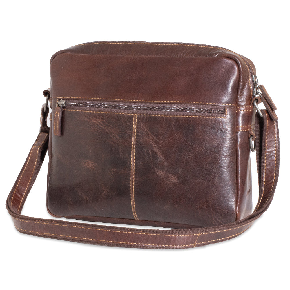 Brown leather shoulder bag on a white background