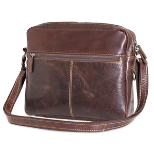 Brown leather shoulder bag on a white background