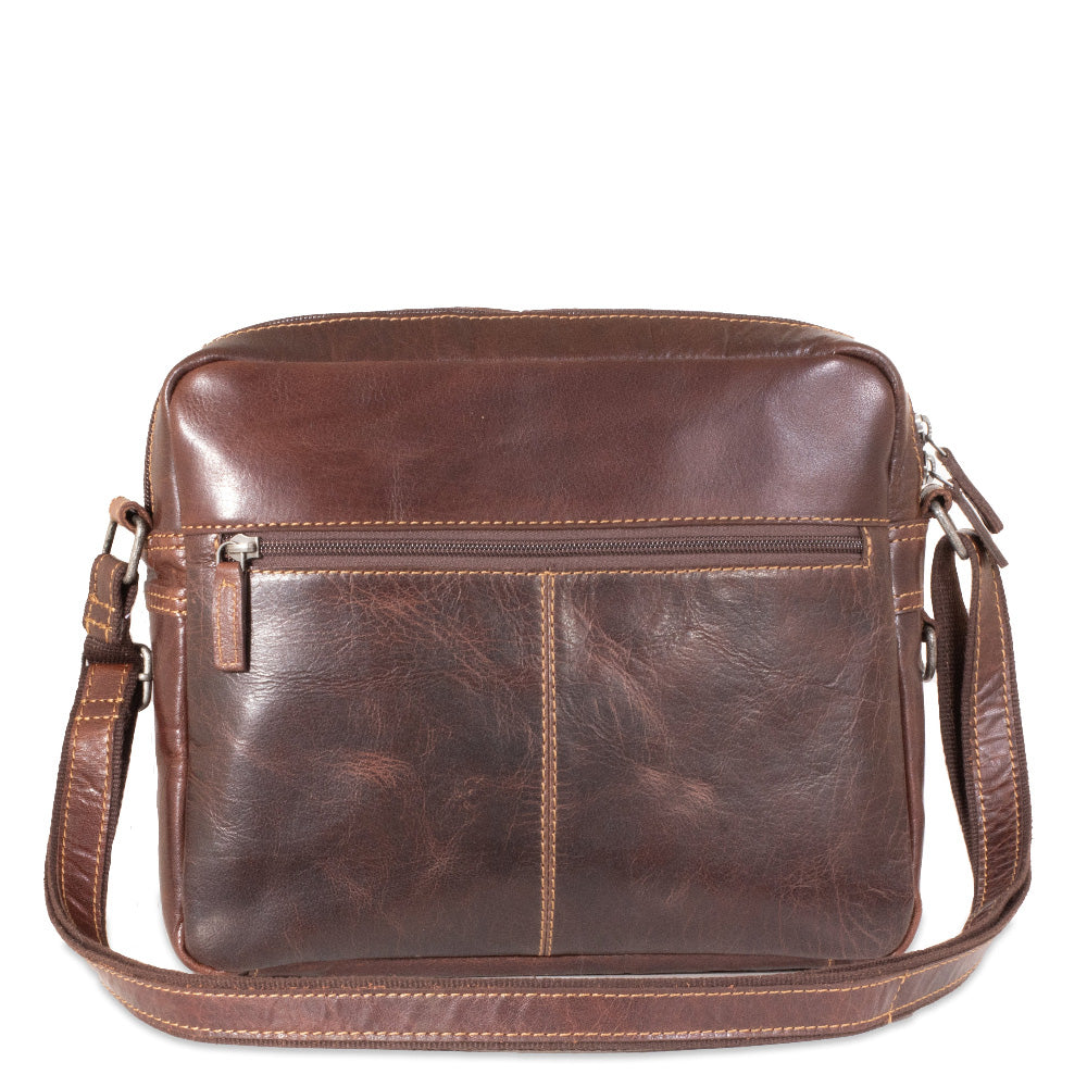 Brown leather shoulder bag on a white background