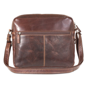 Brown leather shoulder bag on a white background