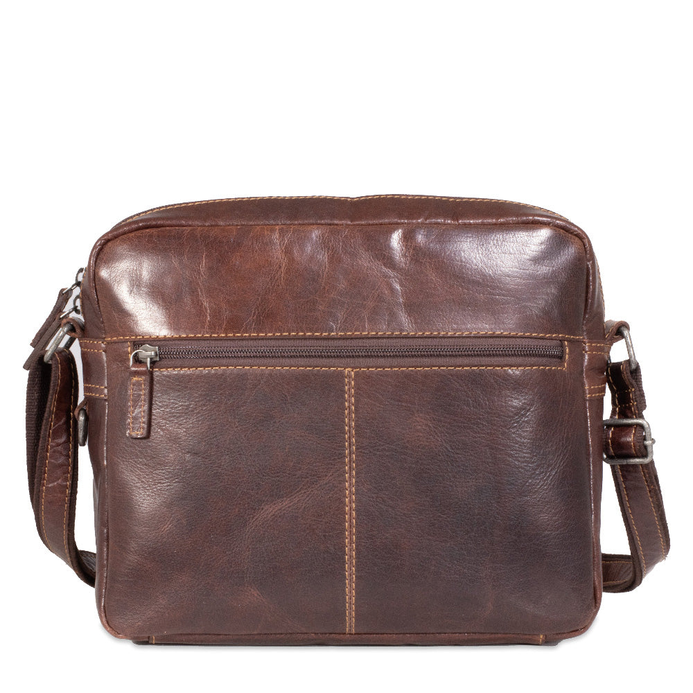 Brown leather shoulder bag on a white background