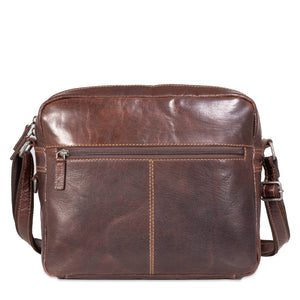 Brown leather shoulder bag on a white background