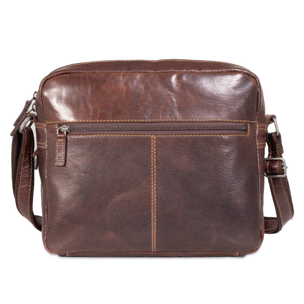Brown leather shoulder bag on a white background