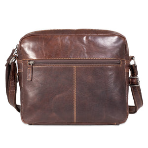 Brown leather shoulder bag on a white background