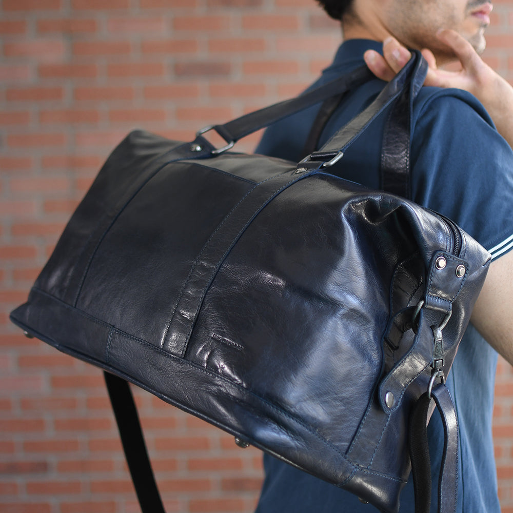 black leather travel duffel bag X RAY Pebbled Faux around top closure with gold The Darrio Black Leather Duffle