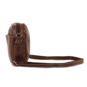 Brown leather crossbody bag on a white background