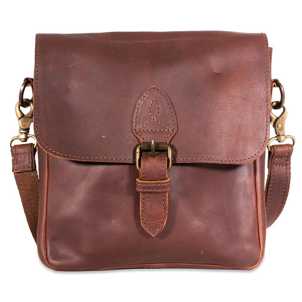 Brown leather satchel bag with gold buckle on a white background