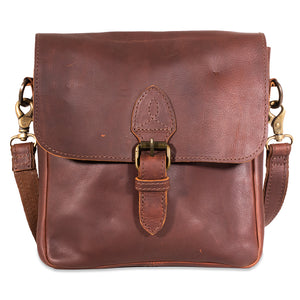 Brown leather satchel bag with gold buckle on a white background