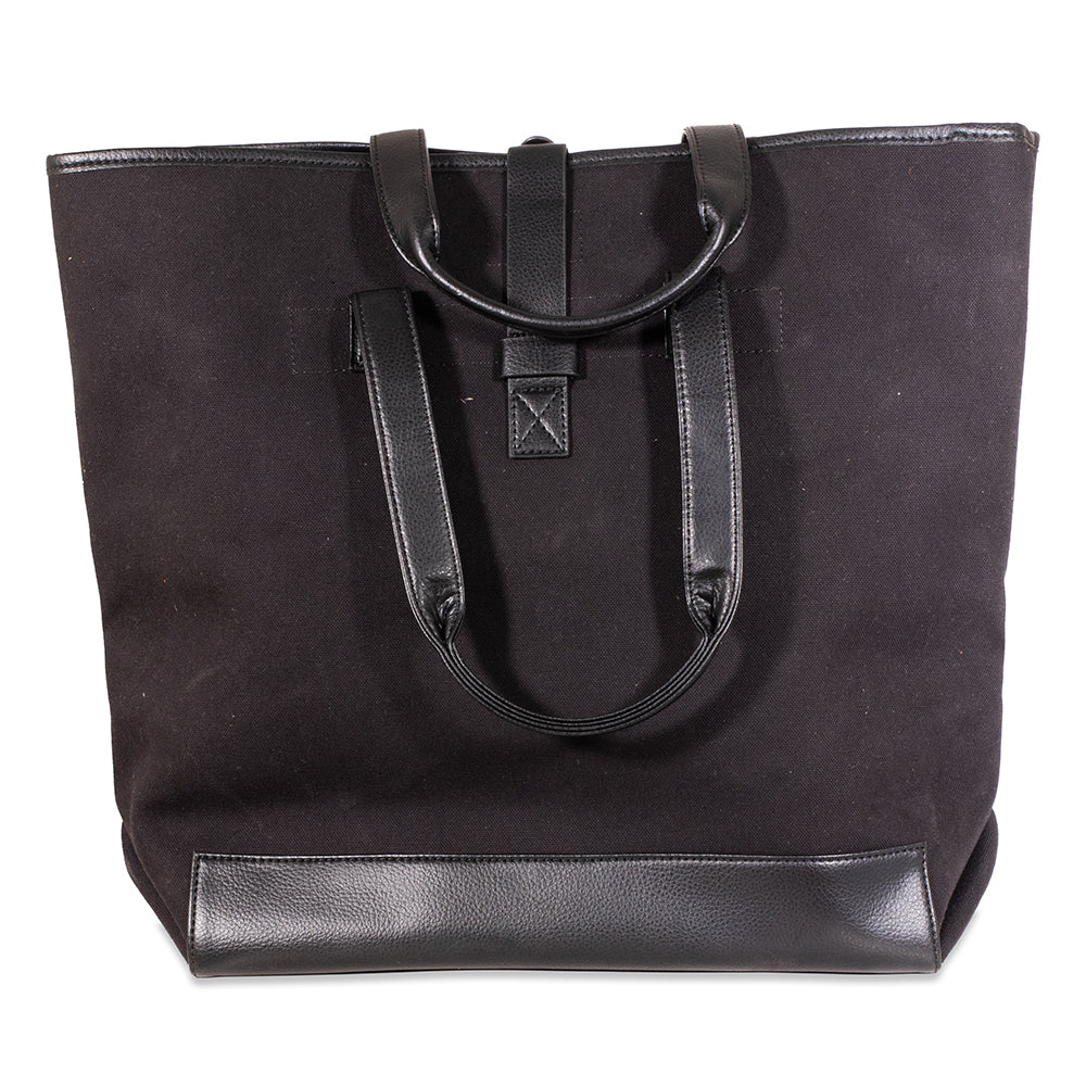Black tote bag with leather accents on a white background
