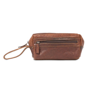Brown leather wristlet with a strap on a white background