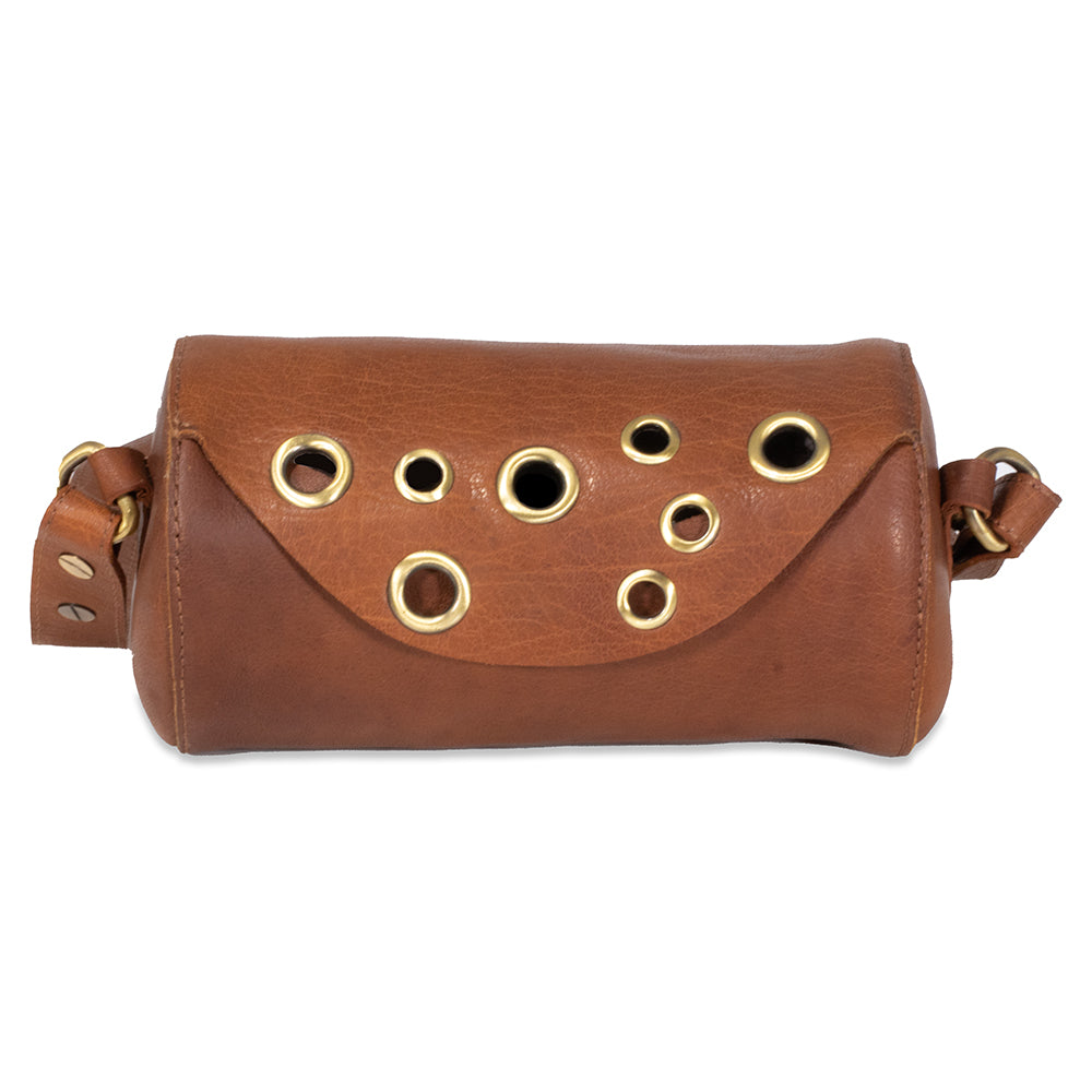 Brown leather pouch with gold eyelets on a white background