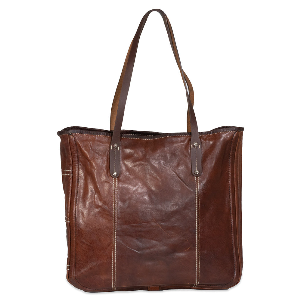 Brown leather tote bag on a white background