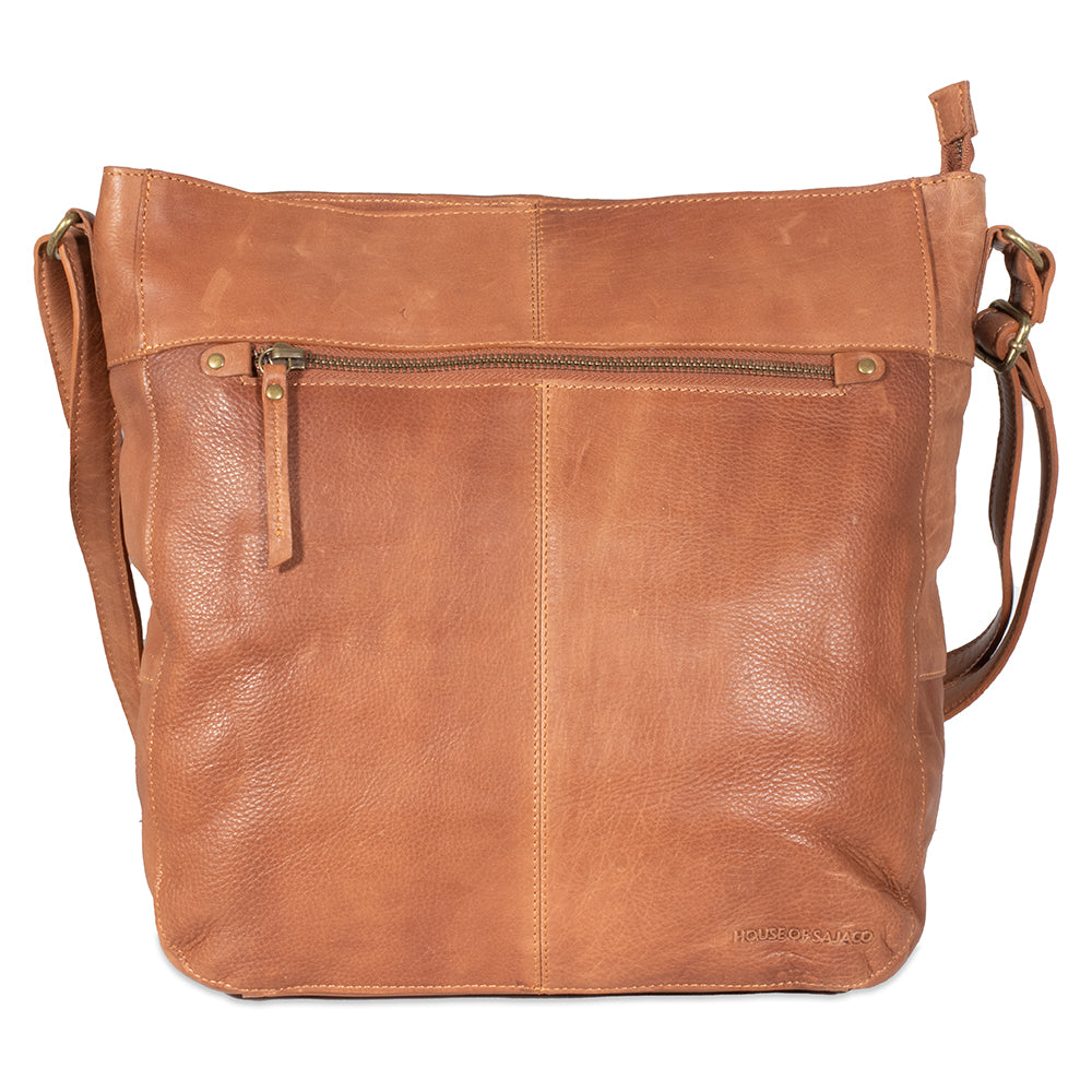 Brown leather handbag on a white background